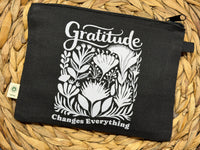 Gratitude Changes Everything zippered hemp pouch (black)