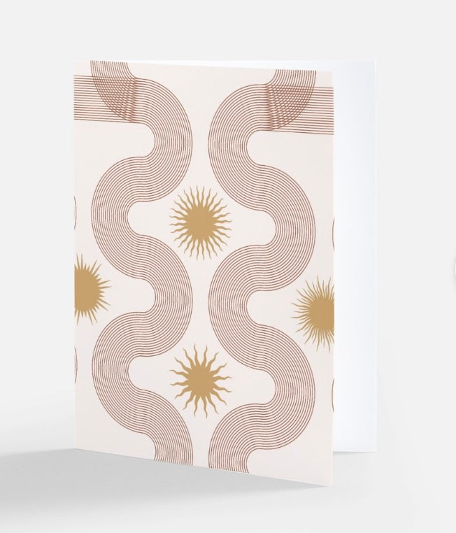 A greeting card featuring abstract linear artwork.