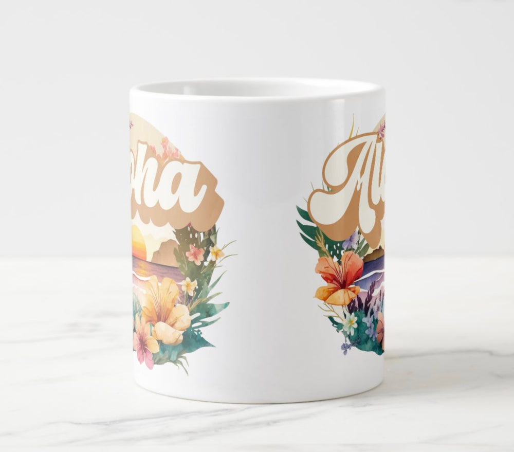 Large white mug with colorful sunset and flowers graphic with word “Aloha”.