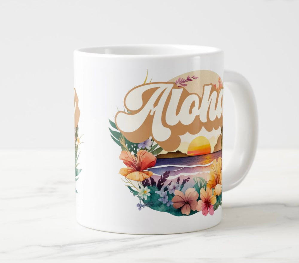 Large white mug with colorful sunset and flowers graphic with word “Aloha”.