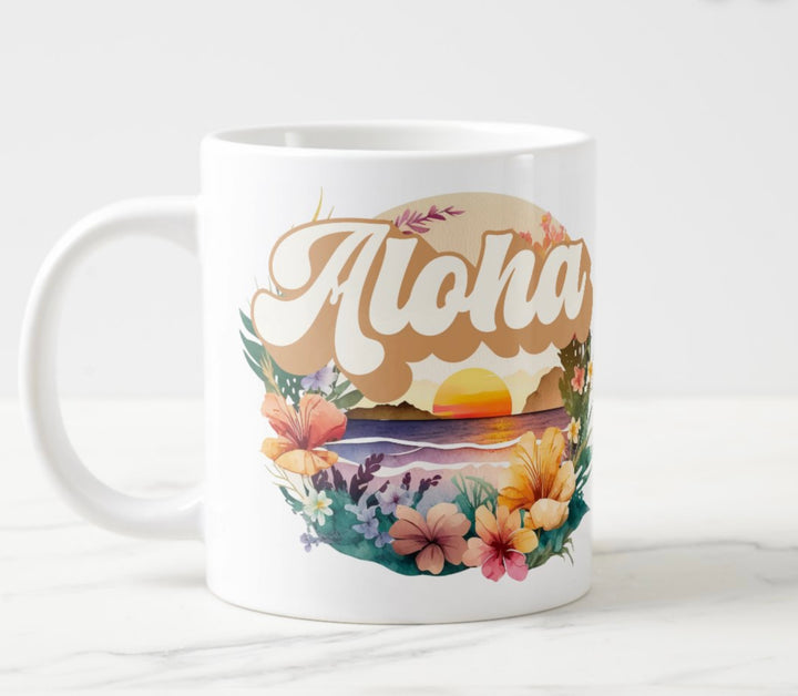 Large white mug with colorful sunset and flowers graphic with word “Aloha”.
