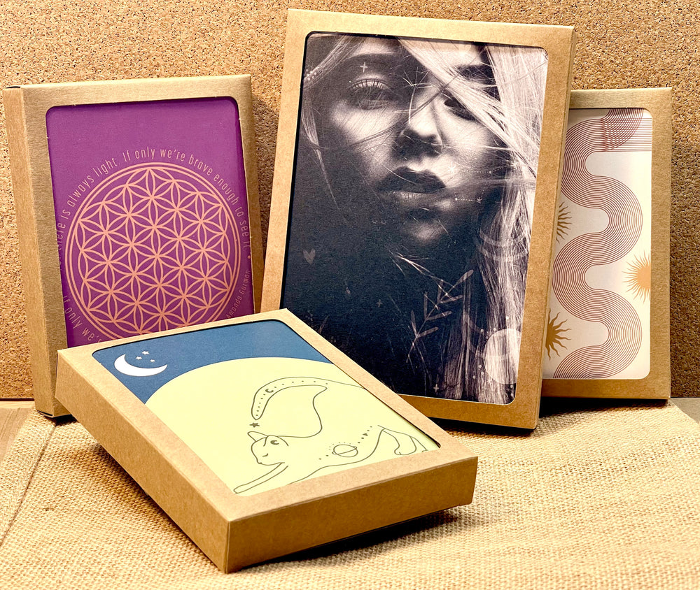 Sample boxes of Ink & Stars greeting cards.