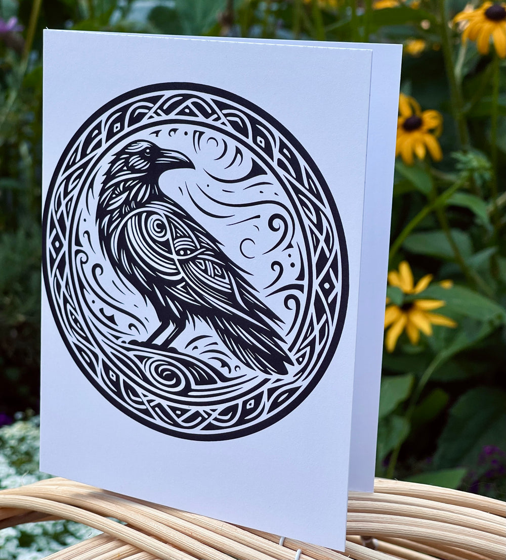 Greeting card featuring an illustrated raven.