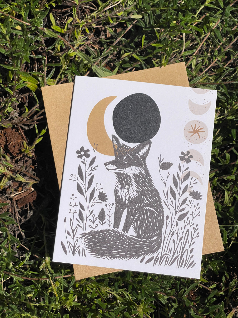 Greeting card  featuring a fox and crescent moon graphic.