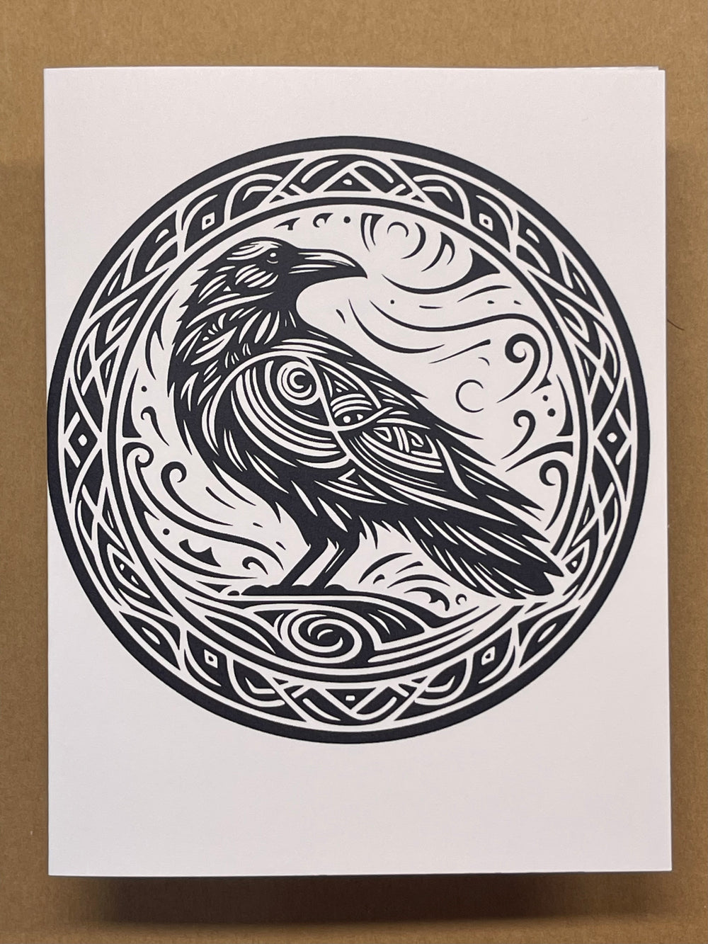 Greeting card featuring an illustrated raven.