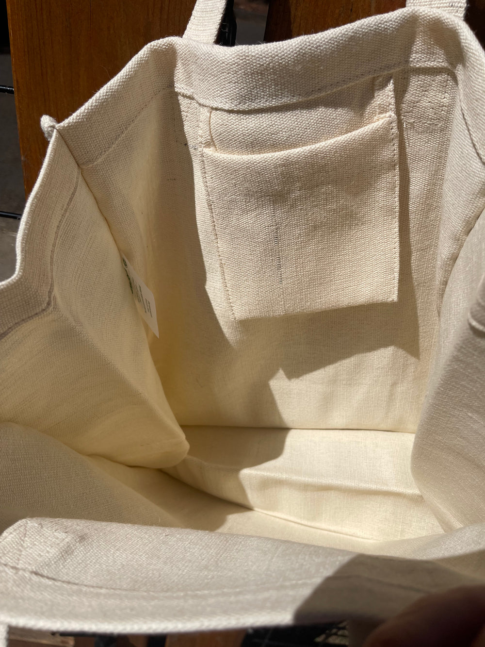 Closeup of inside pocket of tote bag.