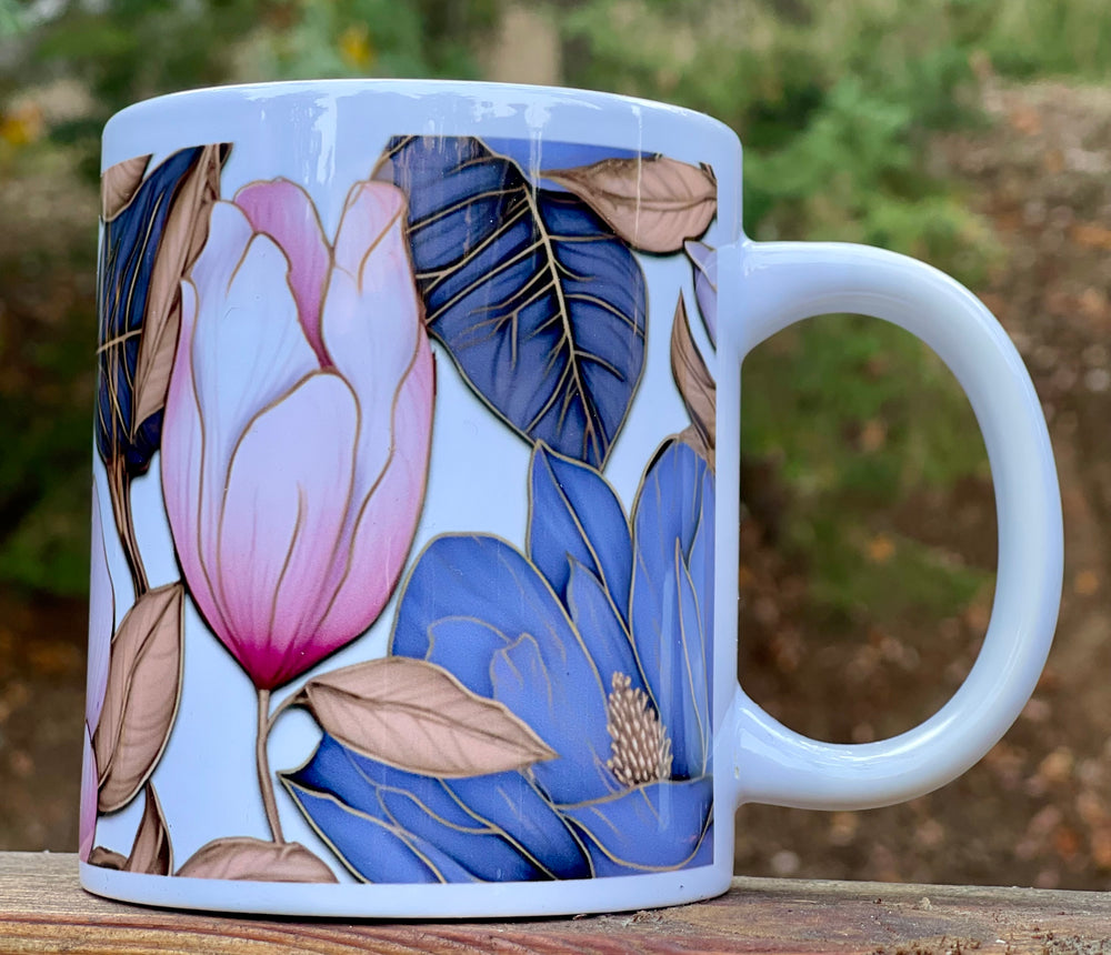 Large white mug with magnolia flower artwork.