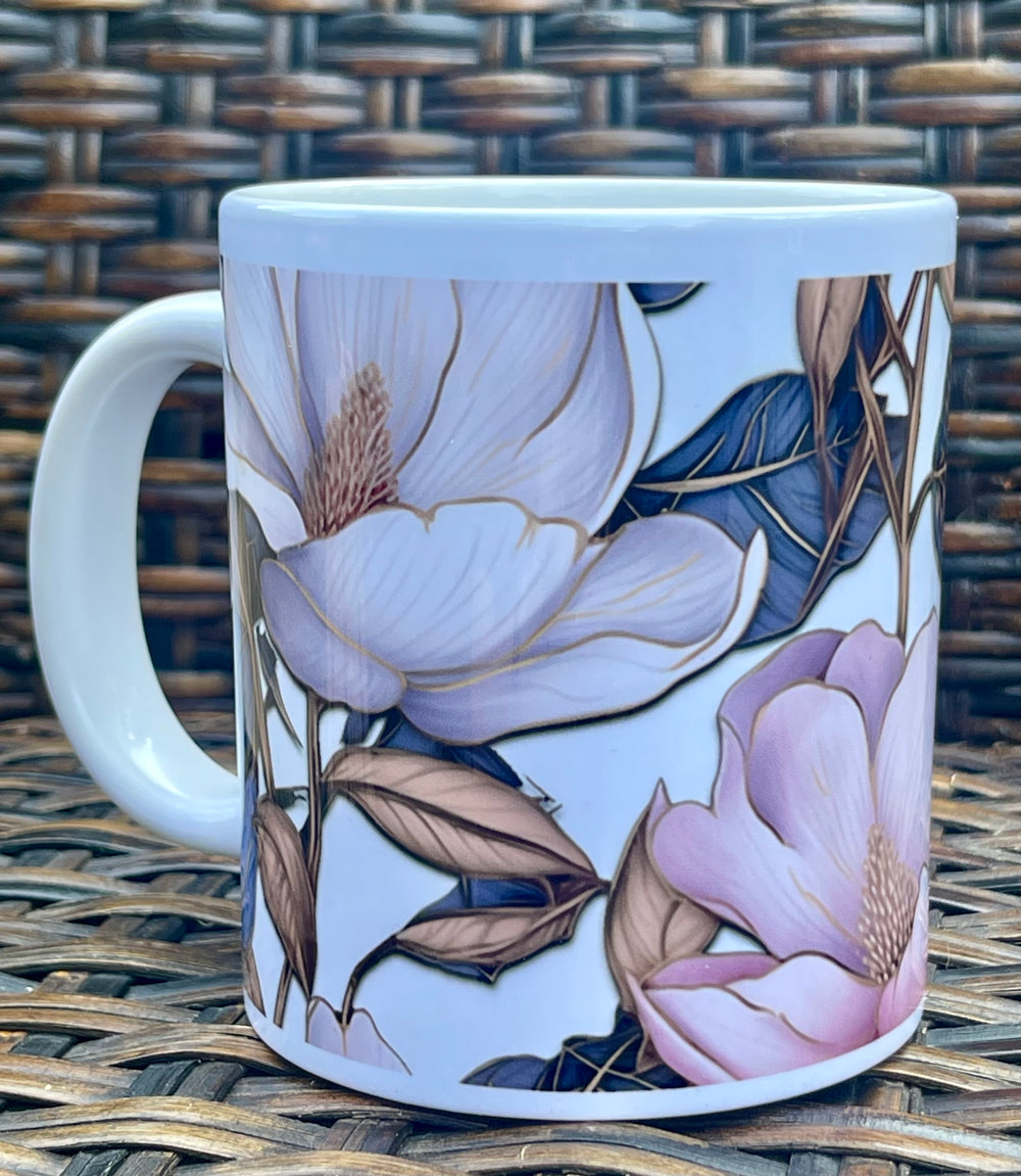Large white mug with magnolia flower artwork.