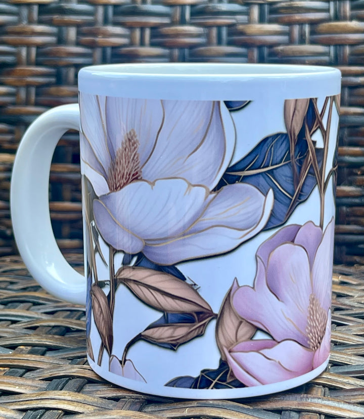 Large white mug with magnolia flower artwork.
