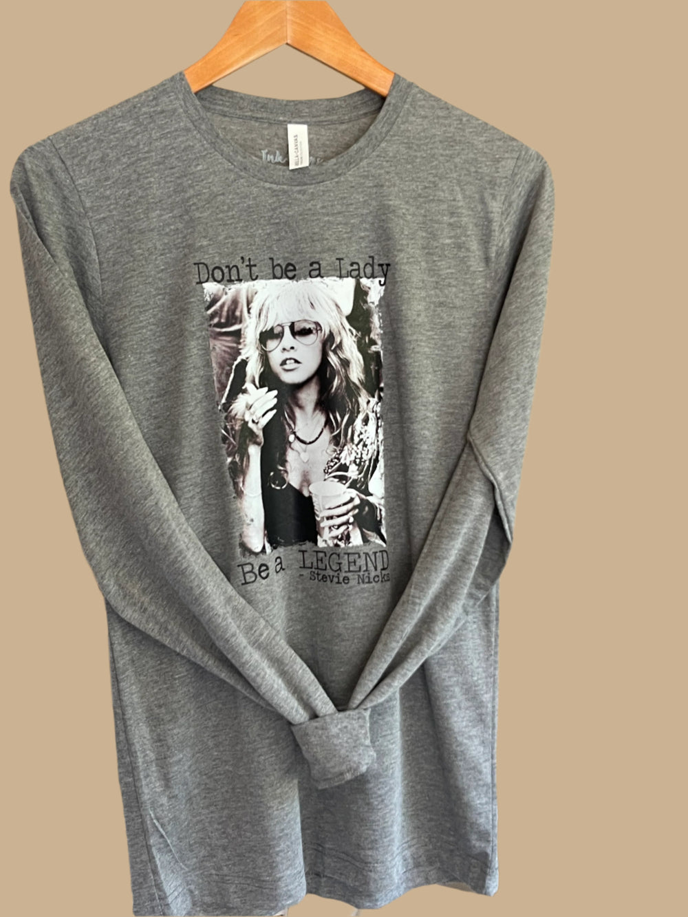 Grey long sleeve tee, with Stevie Nicks graphic on it.