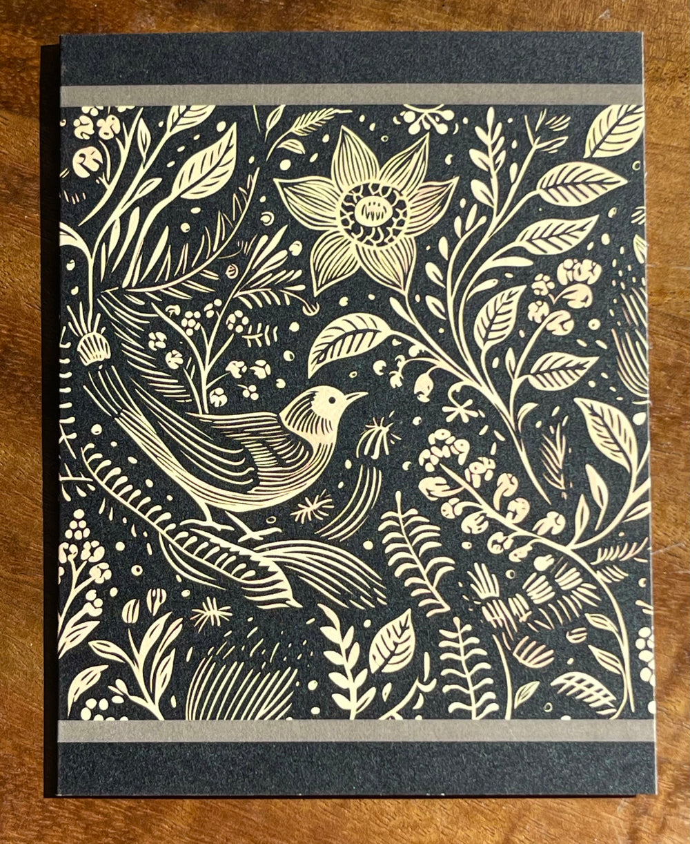Greeting card with black and beige illustration of a bird and flowers.