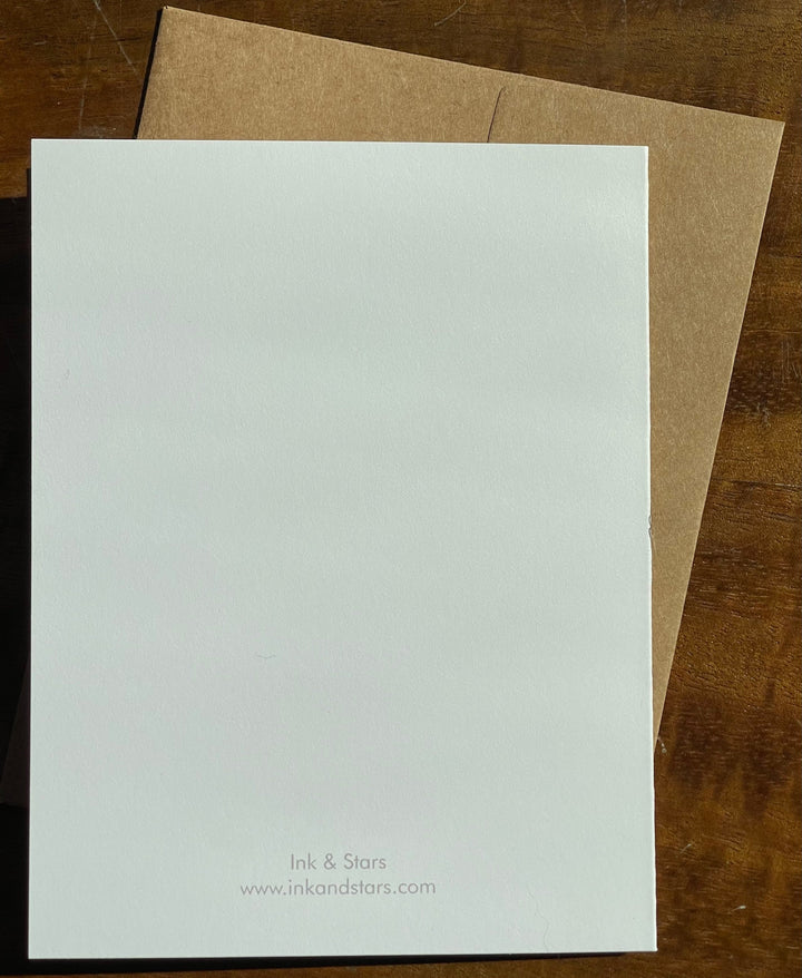 Back of greeting card, with Ink & Stars name and URL, paired with a Kraft paper envelope.