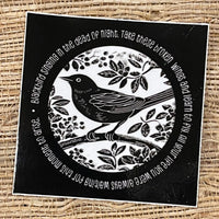 Black and white square sticker, with black bird illustration, and lyrics from the Beatle’s “Blackbird” song circling the image.