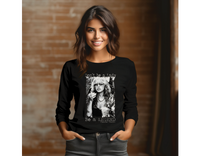 Woman wearing black long sleeve tee, with Stevie Nicks graphic on it.