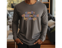 “Easily Distracted By Dogs” graphic on dark grey long sleeve tee.