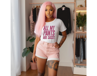 Young woman wearing a short sleeve white tee with “All My Pants Are Sassy” graphic.